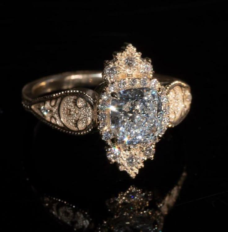 a fancy ring with an oval cut diamond surrounded by smaller round diamonds on a black background