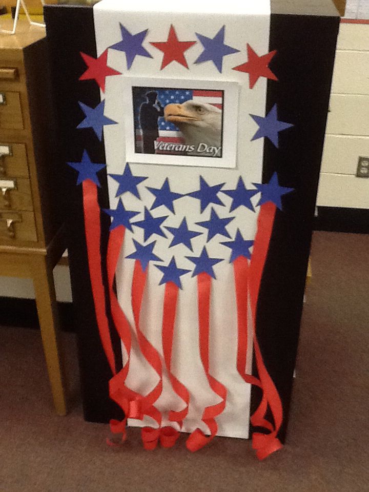 an american flag frame with red, white and blue stars on the front is shown