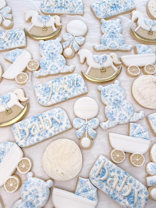 baby shower cookies with blue and white decorations