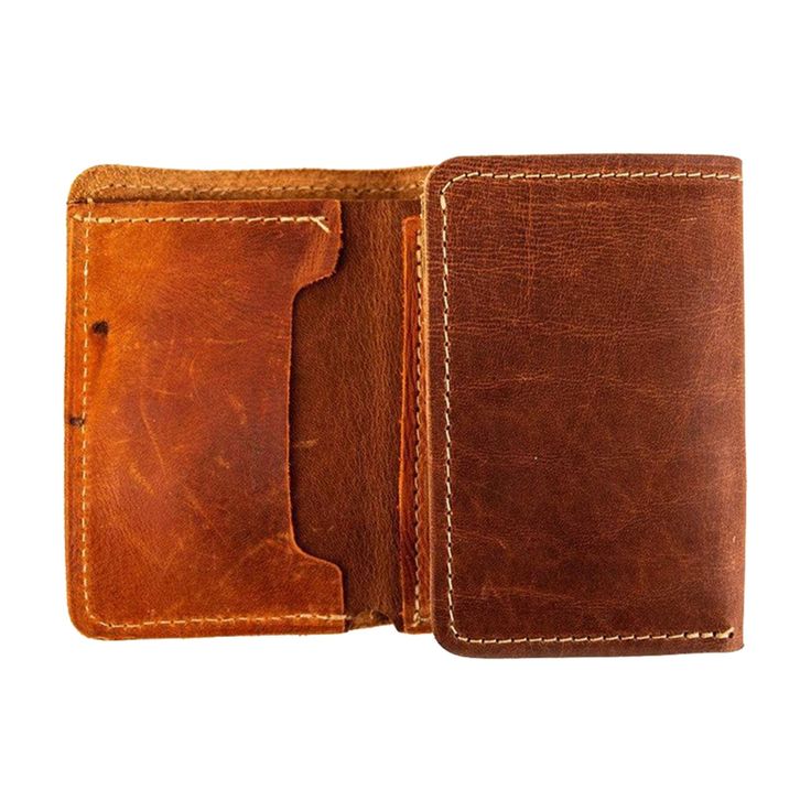 A Truly One-Of-A-Kind BillfoldThe Classics Trifold is handcrafted from vintage baseball glove leather on the front pocket and full-grain steerhide on the back and middle panels. Because every piece of glove leather is unique, when you purchase a Classics Trifold no other person in the world will ever have your same wallet. It's not just a functional accessory; it's a conversation piece. Where Do We Get The Baseball Gloves?FC Goods sources vintage baseball gloves from across America, acquiring gl Leather Trifold Wallet For Everyday Carry, Classic Vintage Brown Leather Wallet, Brown Leather Wallet With Leather Patch, Vintage Leather Wallet With Waxed Finish, Vintage Leather Wallets With Waxed Finish, Vintage Brown Leather Trifold Wallet With Card Slots, Vintage Brown Wallets With Leather Lining, Vintage Brown Wallet With Leather Lining, Bifold Leather Wallet With Waxed Finish