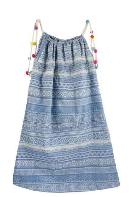 a blue and white dress with tassels hanging from the back, on a white background