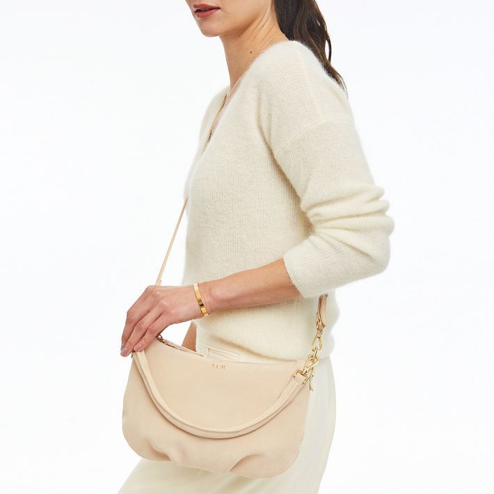 Beautifully crafted from high quality Italian leather or suede, this crossbody features a soft cotton lining, an open pocket inside, and a pleated design that expands to fit more of your on-the-go essentials, including your wallet, phone, keys, and a small cosmetic pouch. This versatile bag can be used as a crossbody or as a shoulder bag by removing the strap and carrying it by the handle. It is perfect for a night out on town or a day full of travel. Make it yours with a foil debossed monogram. True Blue, Cosmetic Pouch, Italian Leather, Belt Bag, Inside Pocket, Zipper Pocket, Night Out, Crossbody Bag, Foil