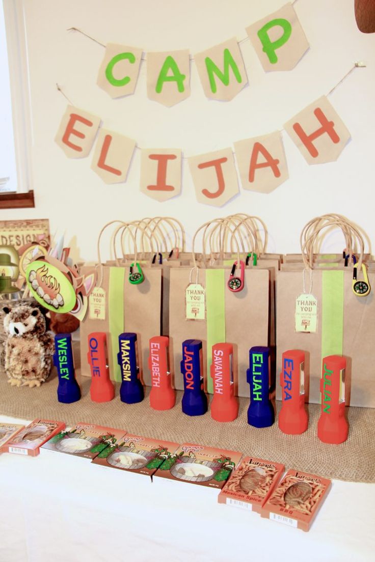 there are many items on the table for camp eli - hah to be displayed