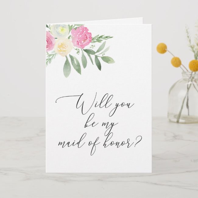 a card with the words will you be my bridesmaid written on it next to some flowers