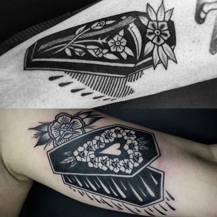 two black and white tattoos on the arms, one with an image of a casket