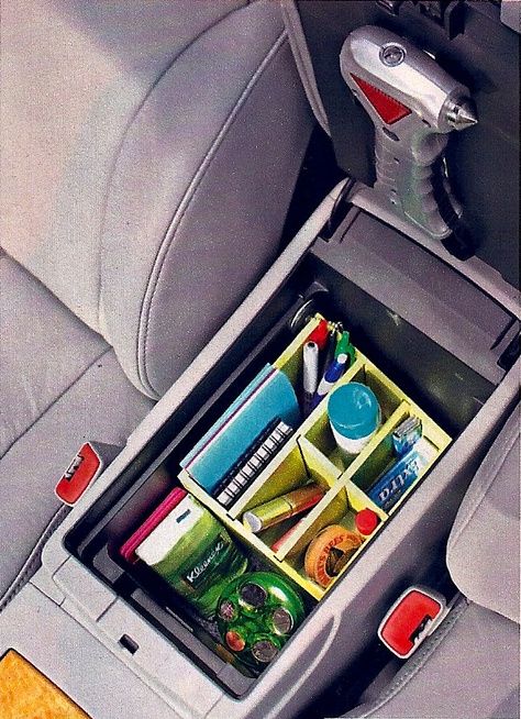 an organized compartment in the back seat of a car