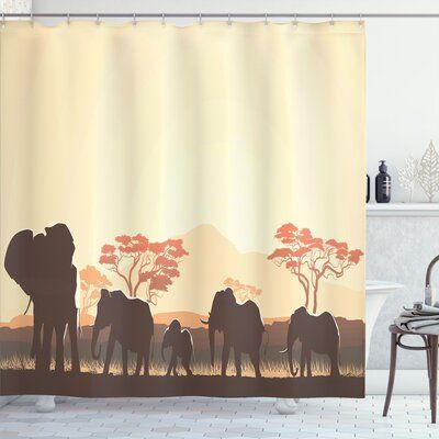 an elephant family shower curtain in a bathroom