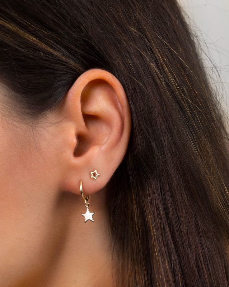 "An everyday go-to pair of huggie hoops. Simple, dainty and classy, these little star hoops are perfect for wearing stacked with other dainty hoops and studs. * Sold as a Pair * D E T A I L S * ∙ Material: .925 Sterling Silver or 18K Gold Plated over .925 Sterling Silver ∙ Dimensions: Hoop diameter: 11mm // Star charm: 8 mm ∙ Hypoallergenic & nickel-free * P A C K A G I N G * ∙ All jewelry is sent out beautifully packaged in our signature box & ready for gifting. ∙ In order to reduce was Huggie Earrings With Star Charm, Minimalist Star Shaped Hoop Earrings, Minimalist Star-shaped Hoop Earrings, Minimalist Star-shaped Hoop Earrings For Pierced Ears, Hoop Earrings With Star Charm, Everyday Hypoallergenic Star Huggie Earrings, Dainty Hoop Earrings With Star Charm, Everyday Huggie Earrings With Star Charm, Star-shaped Hoop Earrings For Everyday