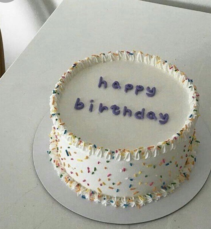 a birthday cake with the words happy birthday written on it