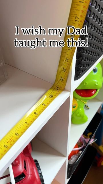 a toy truck is next to a measuring tape on a shelf with the words, i wish my dad taught me this