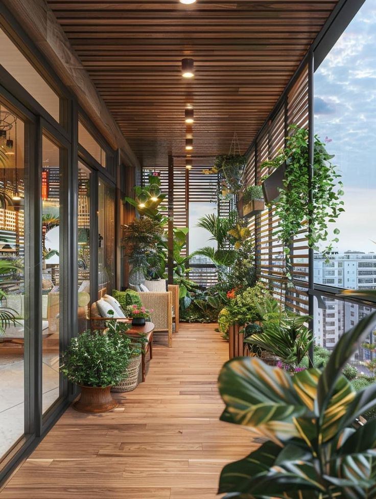 a balcony with potted plants and wooden flooring