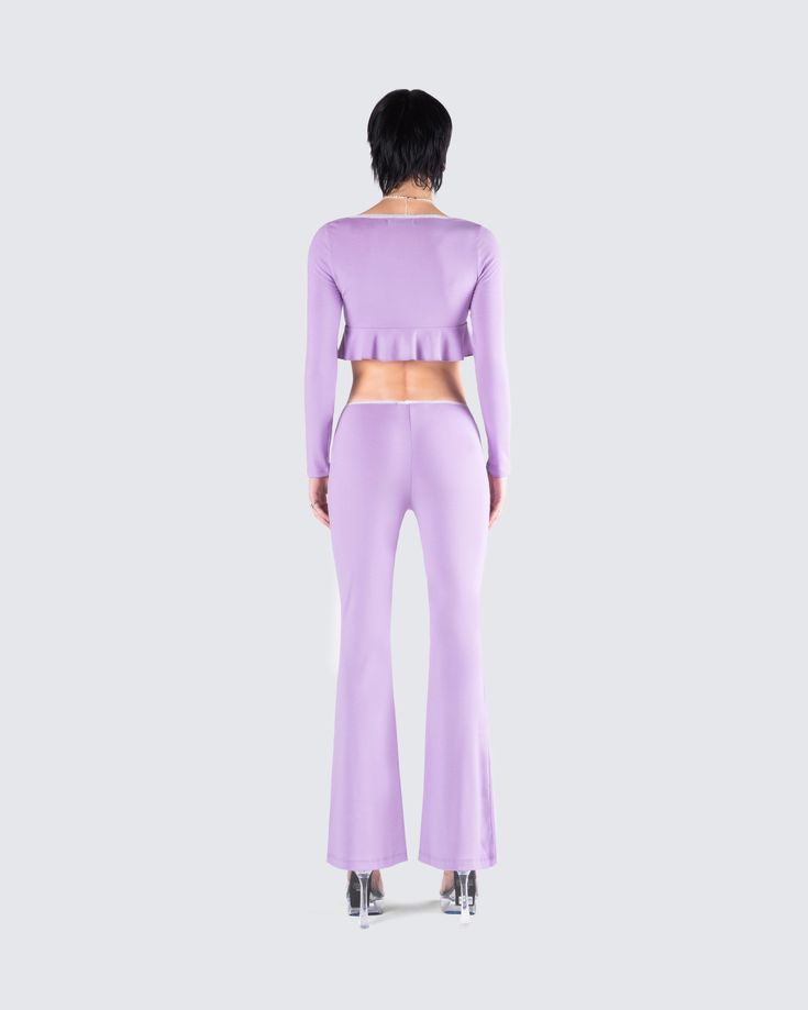 Embrace your playful side in this two-piece set 💜 Featuring a purple rib flyaway top, paired with matching flared pants - this cute and cozy fit is the epitome of flirty allure 😚 Fitted Two-piece Purple Set, Fitted Lavender Loungewear Bottoms, Spring Purple Stretch Sets, Spring Stretch Purple Sets, Purple Stretch Party Sets, Purple Fitted Loungewear Bottoms, Fitted Purple Loungewear Bottoms, Chic Fitted Purple Set, Chic Purple Tops For Loungewear