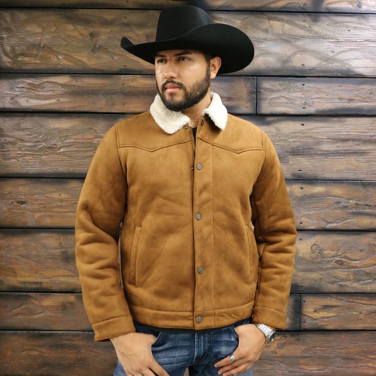 This Mens Suede Trucker Jacket mixes the old west with contemporary fashion. Made out of faux suede, this full-zip jacket has a snap front storm flap. Two side-entry pockets give it that authentic Western look. Throw this jacket on over anything and for warmth and an authentic western look. Zipper and snap closure Adjustable snap sleeves Soft faux sherpa lining and collar Western Style Winter Outerwear With Snap Buttons, Winter Outerwear With Pockets For Rodeo, Winter Rodeo Outerwear With Pockets, Western Style Winter Outerwear For Rodeo, Western Winter Outerwear For Rodeo, Brown Winter Outerwear For Rodeo, Classic Fall Outerwear For Rodeo, Western Winter Outerwear For Ranch, Western Style Outerwear With Snap Buttons For Fall