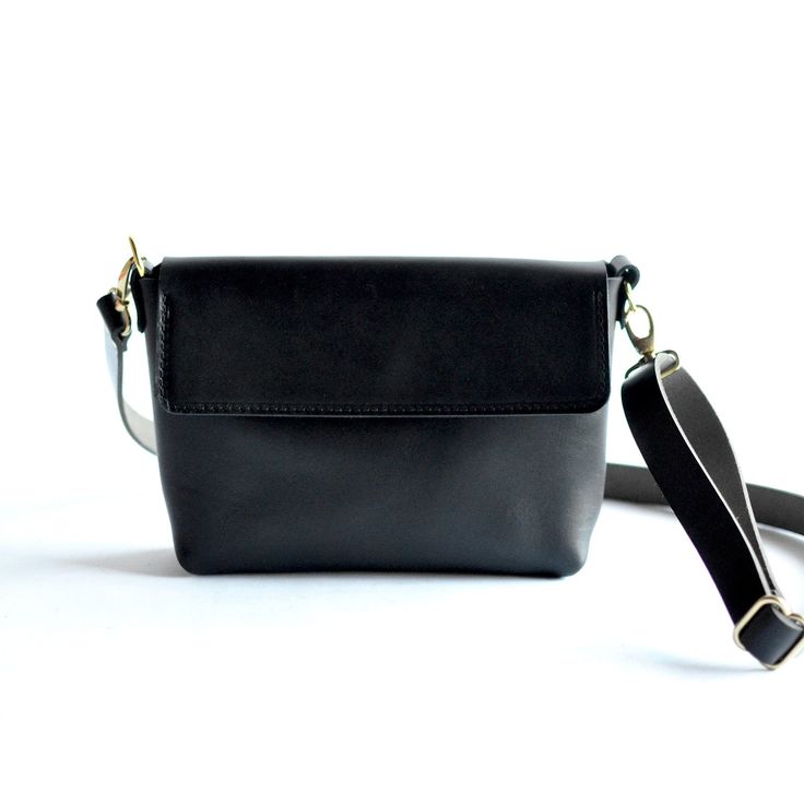 We have nothing but love for this bag! Harlow transforms seamlessly from clutch to a hands-free bag with strap. With an adjustable strap, you can transition from crossbody to a shoulder bag and any length between.Black LeatherBlack Leather StrapBrass Hardware ... • Fast & FREE Shipping on orders over $150• Made with a single piece of Full-Grain leather• Magnetic snap closure• Open interior pocket• Measurements: 10.5" wide across top, 9” wide across bottom, 6.5" high, 2.5" deep• Removable adjusta Minimalist Crossbody Satchel With Detachable Strap, Everyday Crossbody Satchel With Gunmetal Hardware, Minimalist Clutch Shoulder Bag With Detachable Strap, Minimalist Crossbody Flap Bag With Detachable Strap, Minimalist Crossbody Satchel With Adjustable Strap, Minimalist Crossbody Shoulder Bag With Adjustable Strap, Everyday Clutch Belt Bag With Adjustable Strap, Versatile Black Leather Flap Bag, On-the-go Crossbody Satchel With Gunmetal Hardware