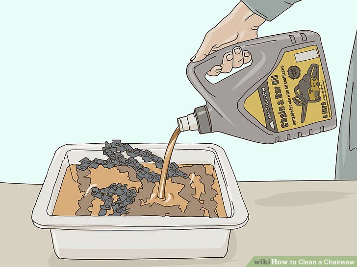 a person is pouring oil onto a dish full of food that has been cooked in the oven