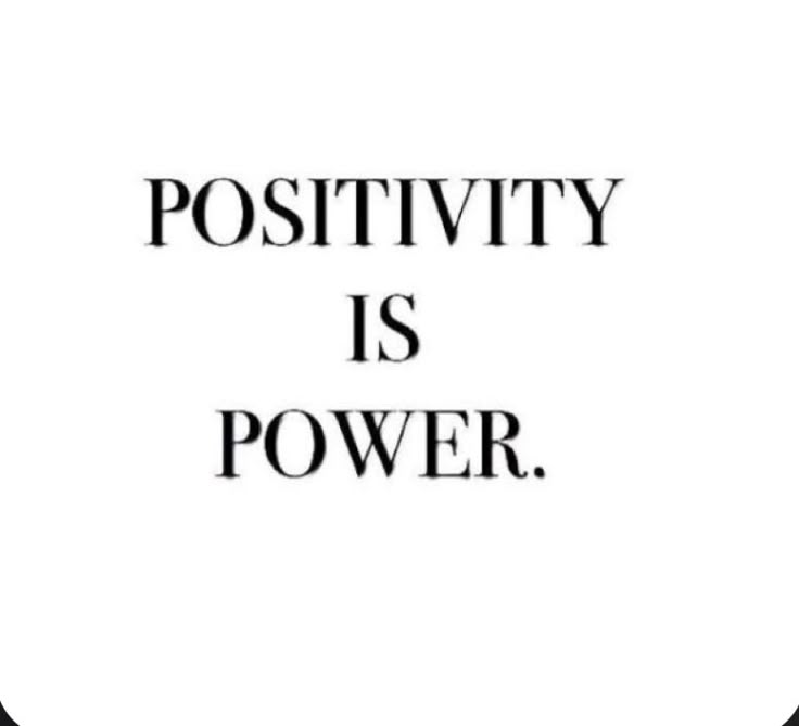 the words positivity is power are in black and white on a square frame