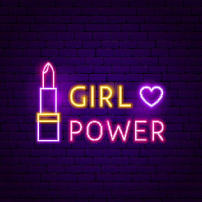 a neon sign that says girl power with a pencil in the shape of a heart