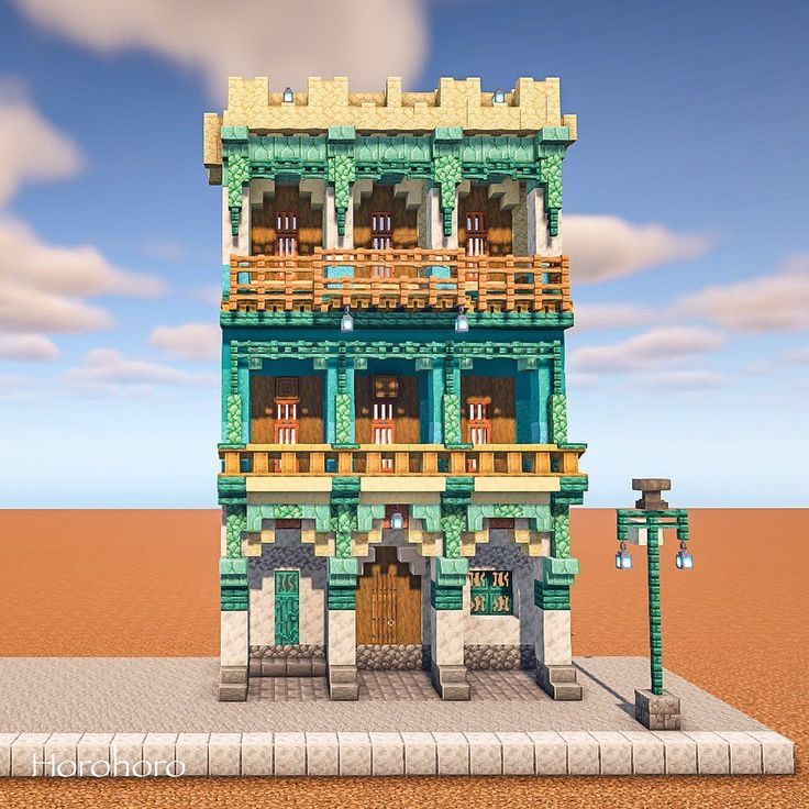 an image of a building made out of lego blocks in the middle of the desert