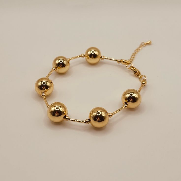 - Sterling Steel Gold Plated - 7” + Ext - Colombian Accessories Elegant Metal Bracelet With 8mm Beads, Elegant Gold Bracelets With Large Beads, Gold Charm Bracelet With Round Beads For Party, Gold Bracelets With 8mm Beads For Party, Party Gold Bracelet With 8mm Beads, Gold Bracelets With Large Beads, Gold Bracelets With Large Beads For Party, Gold Bracelet With Large Beads For Party, Gold Bracelets With Polished Beads For Party