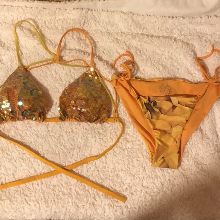 Just Lowered Price Yellow/ Multicolored New Never Worn. Bikini Bought In Bali, It Is Pristine Top Strings Criss Cross In Back In X Shape You Only Have To Tie It At The Bottom. This Is A Great Suit. I’m Sorry I Never Had An Opportunity To Wear It. Should Fit Small And Slim Medium. Fitted Orange Swimwear For Party, Orange Fitted Swimwear For Festival, Festival Fitted Orange Swimwear, Fitted Orange Swimwear For Festivals, Orange Stretch Swimwear For Party, Gold Triangle Top Swimwear For Festivals, Summer Party Orange Swimwear, Gold Fitted Swimwear For Festival, Fitted Gold Swimwear For Festival