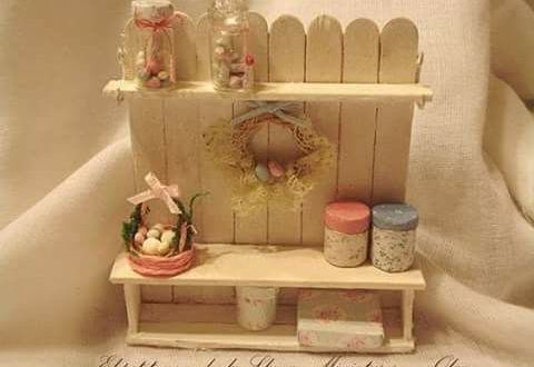 a dollhouse shelf with various items on it