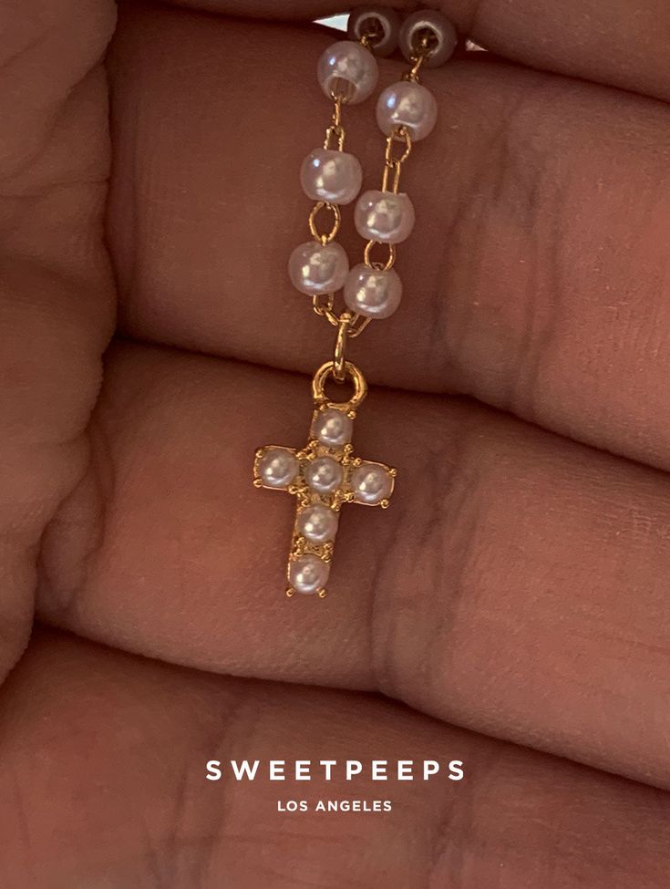 Product Details + Care - 18K Gold Dipped Over Brass - Brass: Copper + Zinc Alloy - 1 Necklace - Wipe Clean - Imported Dimensions - Chain is approximately 16" Have a question? Please message info@shopsweetpeeps.com and our support team will get back to you in 48 hours. Gold Pearl Cross Pendant Necklace, Pearl Cross Necklace, Cross Gold, Dainty Gold Necklace, Silver Jewelry Pendant, Gold Dipped, Pretty Rings, Coin Necklace, Dainty Earrings