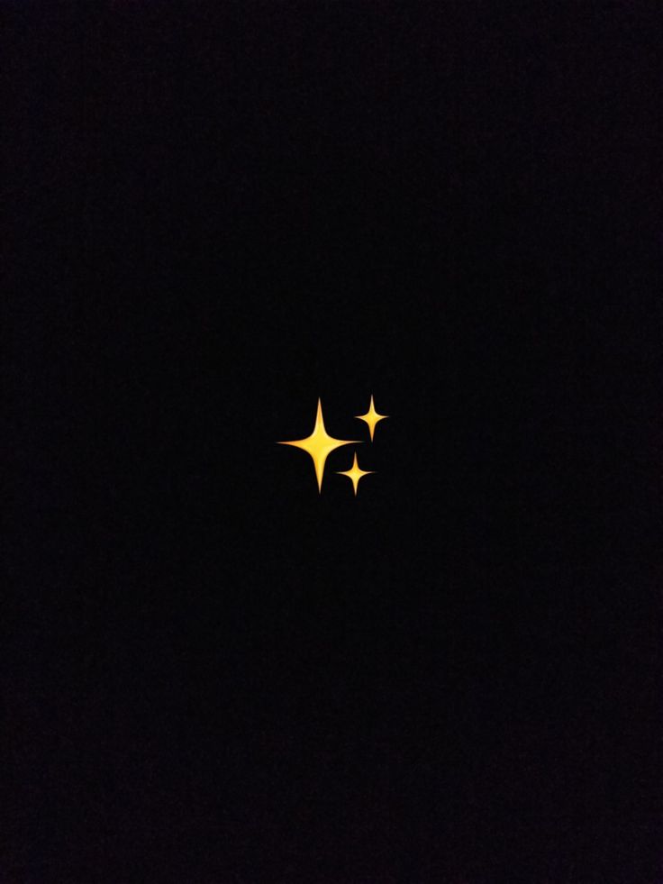 three stars are seen in the dark sky