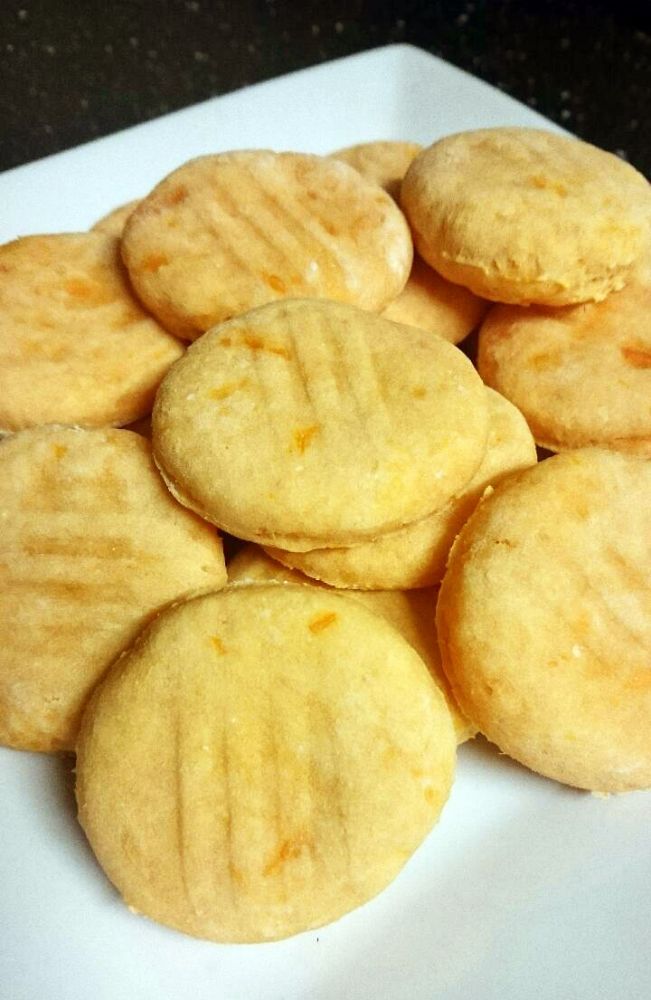 a white plate topped with cookies on top of a table