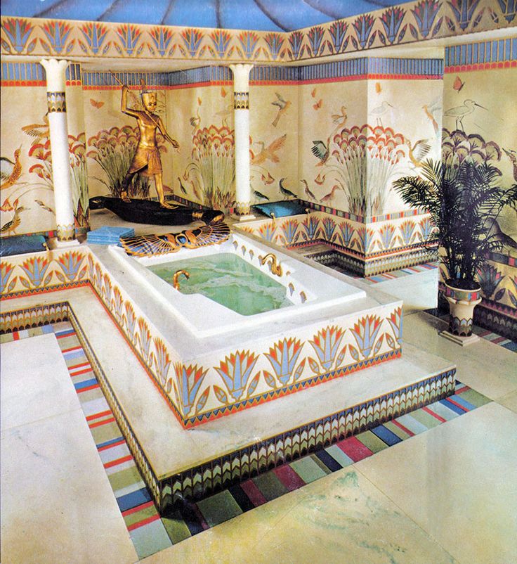 an ornately decorated bathroom with a jacuzzi tub