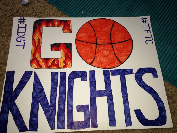 a sign that says go knights with a basketball on it