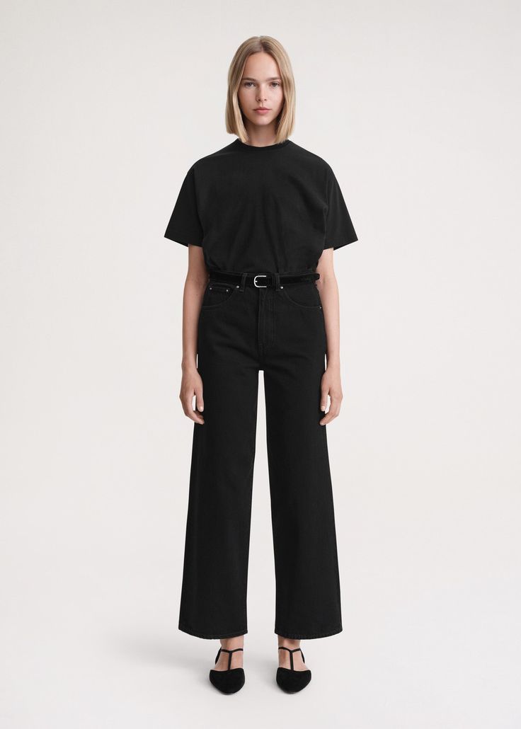 The high waist and wide legs of TOTEME's jeans are a nod to the 1970s. Made in Italy from rigid organic cotton that will soften with each wear, they feature belt loops and five pockets and are fitted on the hips before flaring toward the slightly cropped cuffs. Create a leg-lengthening illusion by styling them with a tucked-in top.