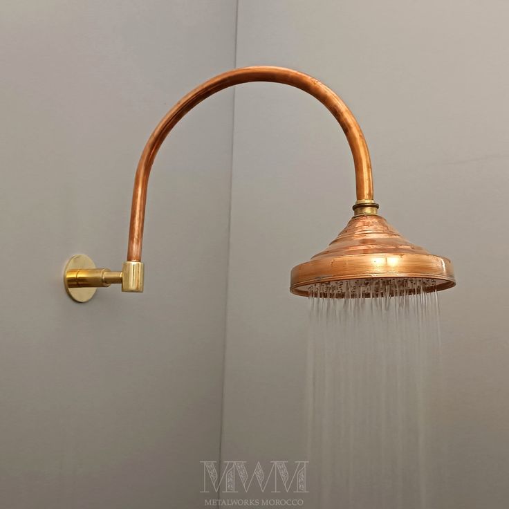 a shower head with water flowing from it