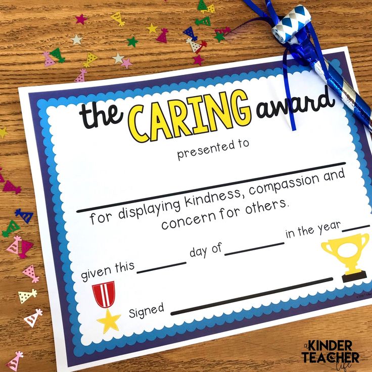 the caring award certificate is on top of a wooden table with confetti and streamers