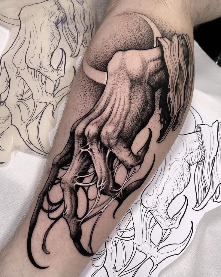 a man's arm with an octopus tattoo on it