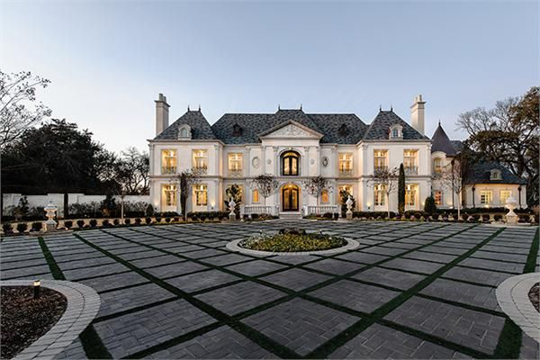 a large white house with lots of windows