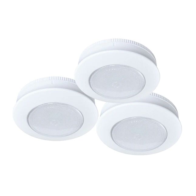 three white downlights on a white background