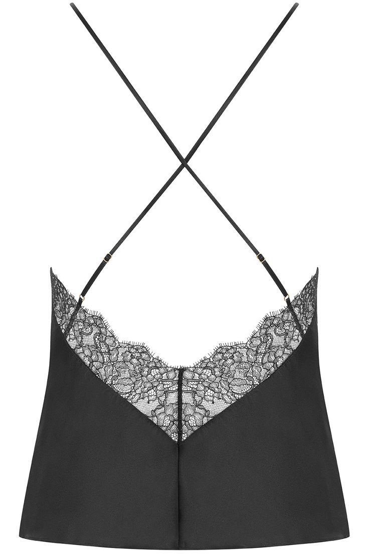 A must-have nightwear piece, the Rendez-Vous cami from Maison Close gives women a chic, glamorous look with deep black silk and delicate eyelash lace. Elegant, graceful and remarkably comfortable, this luxurious piece can be worn as nightwear with the matching shorty or as outerwear styled with the wrap-over skirt.• Designed in France by Maison Close.• Luxury camisole top in deep black.• V neckline.• Open back.• Thin crossed adjustable shoulder straps.• Soft silk.• Non-stretch eyelash lace.• Composition: 100% silk, lace (100% polyester). Silk And Lace, Silk Lace, Lace Camisole, Deep Black, Skirt Design, Black Silk, Nightwear, Shoulder Straps, Open Back