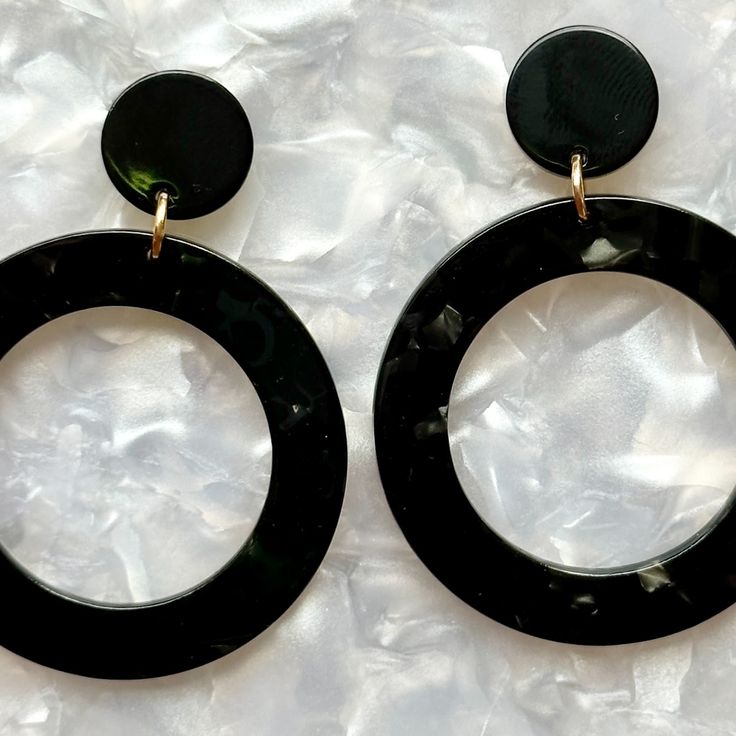 Classic to the max. Our simple open circle drop earring featured in a chic and classic black with matching stud.  Designed for Closet Rehab. Handmade in Pittsburgh, PA. Made in the USA. Materials: acrylic, brass base posts/jump rings with 18k gold plating Hypoallergenic  Our accessories are handcrafted from colorful acrylic. To preserve your Closet Rehab products, we recommend storing safely in our pouches. Avoid contact with harsh substances like perfumes and hairsprays. Items with plated metal Black Closet, Mini Hoop Earrings, Forever Jewelry, Acrylic Jewellery, Jewelry Ring Box, Black Hand, Pittsburgh Pa, Mens Jewelry Bracelet, Watches Jewelry