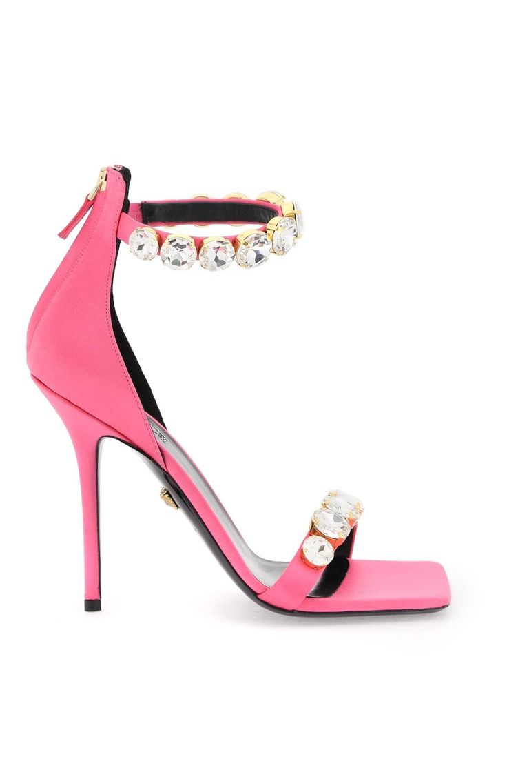 Versace sandals made of silk satin and embellished with maxi crystals on the front band and ankle. Rear zipper closure, leather insole and leather sole. Versace Sandals, Versace Pink, Satin Sandals, Versace Gold, Leather Cap, Pumps Flat, Gianni Versace, Roberto Cavalli, Victoria Beckham