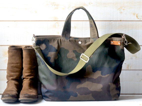 Camouflage Canvas tote bag, Waxed canvas tote bag, Military tote bag, Crossbody weekender bag or diaper bag.14 oz Waxed canvas Tote bag, messenger bag for men and women. Camouflage Waxed Canvas bag comes a removable adjustable crossbody strap or briefcase handles, Fully lined with waterproof cotton fabric and inside optional 1 ZIPPER POCKET and 5 POCKETS.1 READY FOR SHIPPING wıth BROWN LINING-This designer bag is roomy, versatile, elegant, casual, chic, completely functional, and stylish yet con Waxed Canvas Tote Bag, Back To School Bag, Camo Purse, Waxed Canvas Bag, Back To School Bags, Sustainable Bag, Sac Week End, Bike Bag, Elegant Casual