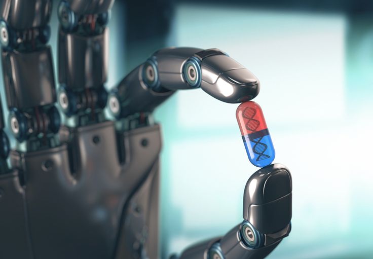 a robotic hand holding a red and blue button