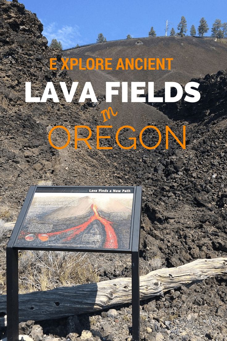 there is a sign on the side of a hill that says explore ancient lava fields in oregon