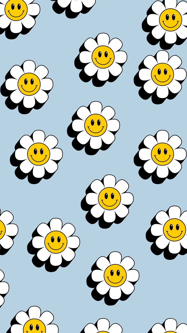 a bunch of white and yellow flowers with smiley faces on them, all over a blue background