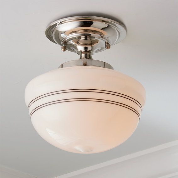 a close up of a light fixture on a ceiling