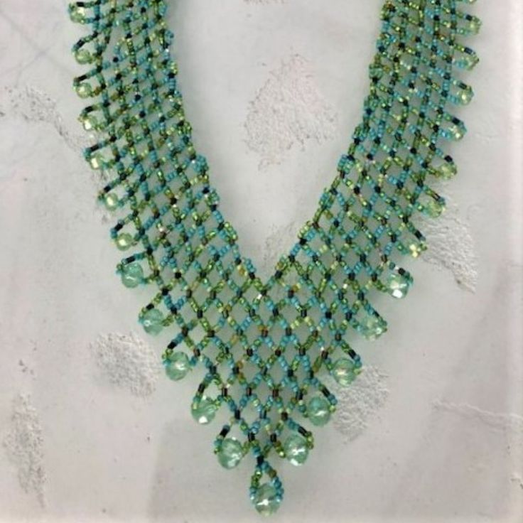 Artisan Czech Glass Bead 20" Long Fashion Statement "V" Style Necklace Turquoise, Lime Glass Beads Necklace With Shimmering & Iridescent Beads Easy To Open/Close Magnetic Clasp One Of A Kind Necklace Handcrafted/No Two Are Exactly Alike Would Be Perfect For A Get-A-Way Destination Dress! Necklace Is Made In Guatemala Using Artisan Crafted Czech Glass Beads. Czech Glass Beads Are Know World Wide For Their Quality, Vibrant Colors Principles Of Fair Trade Upheld Turquoise Round Beads Necklace For Party, Turquoise Necklaces With Round Beads For Party, Turquoise Faceted Beads Necklaces For Party, Party Turquoise Beaded Necklaces With Faceted Beads, Handmade Green Crystal Necklaces, Party Turquoise Faceted Beaded Necklaces, Green Crystal Beaded Necklaces As Gift, Green Crystal Beaded Necklace For Gift, Green Gemstone Party Beads