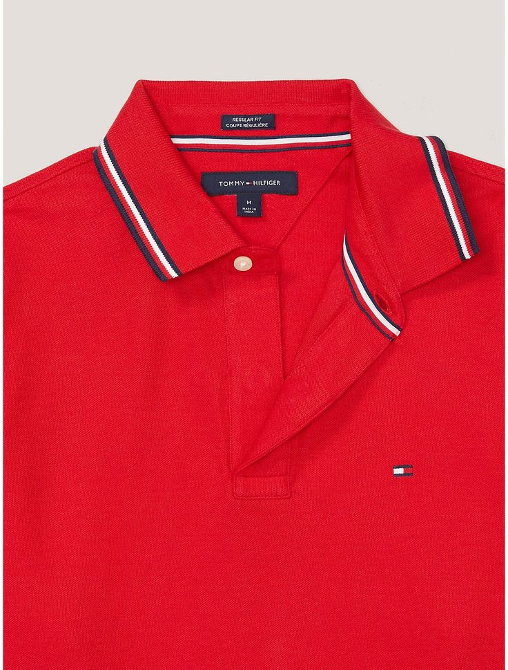 Tommy Hilfiger men’s polo. Our iconic polo gets a revamp in high-performance, quick-dry fabric that wicks away moisture. Part of our Adaptive Collection, designed for ease of dressing in classic Tommy style.  Material: 60% Cotton, 40% Polyester. Classic Tommy Hilfiger Collared Polo Shirt, Sporty Tommy Hilfiger Collared Polo Shirt, Classic Polo Shirt With Polo Collar For Sports, Tommy Hilfiger Store, New Baby Boys, Kids Sale, Tommy Hilfiger Man, Tommy Jeans, Wicks