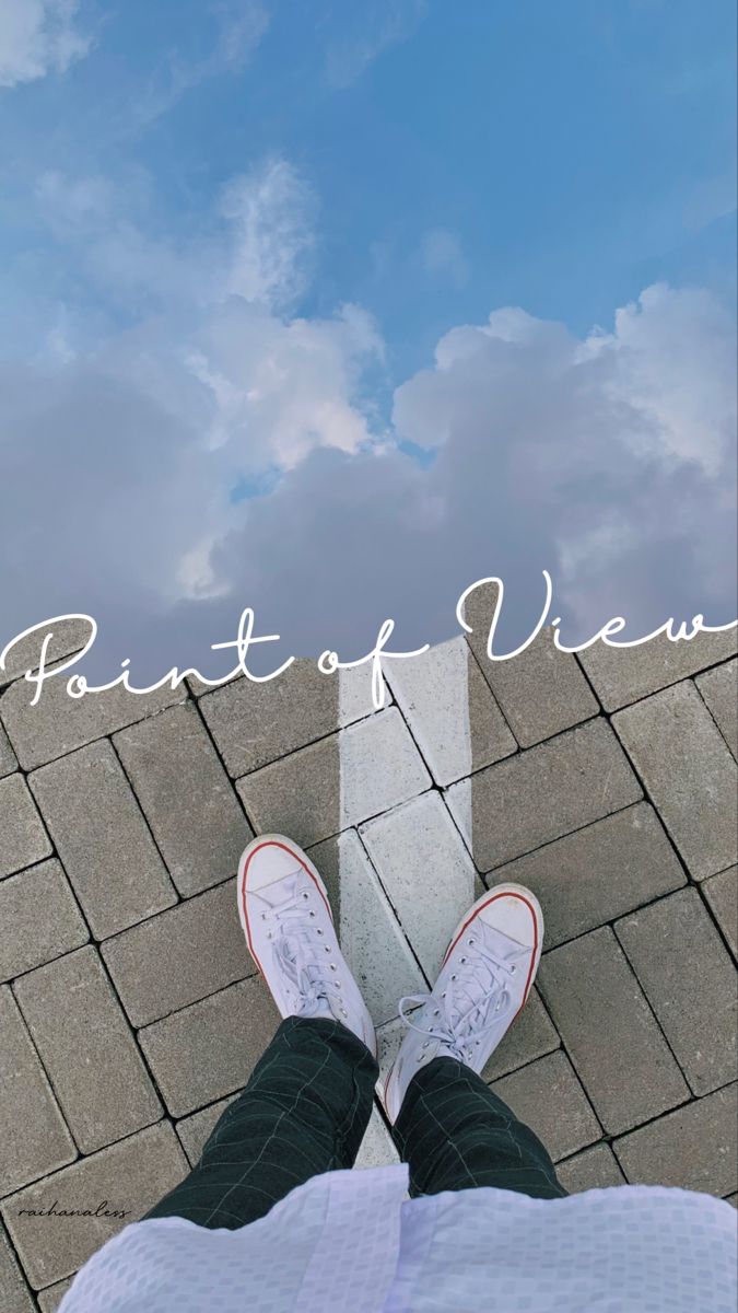 a person standing on top of a brick walkway with the words point of view above them