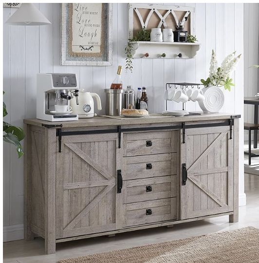 a kitchen area with a counter, cabinets and shelves on the wall above it is a potted plant next to a coffee maker