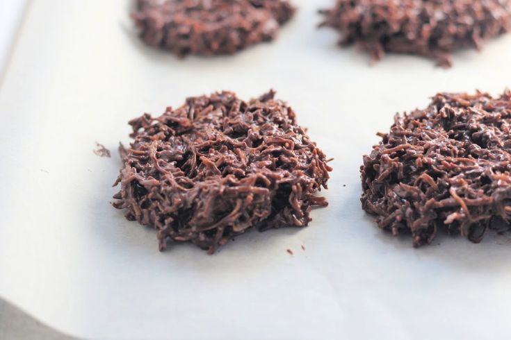 chocolate cookies on a baking sheet ready to be baked