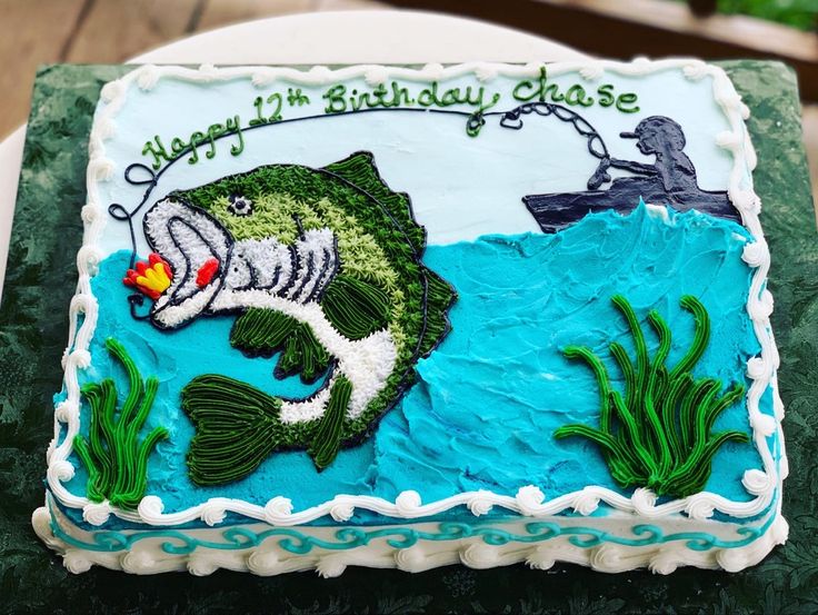 a birthday cake with a fish on it